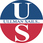 A circular logo with the letters 'U' at the top and 'S' at the bottom. Across the center, it reads 'Ullman Sails.' The logo is divided horizontally with dark shades.
