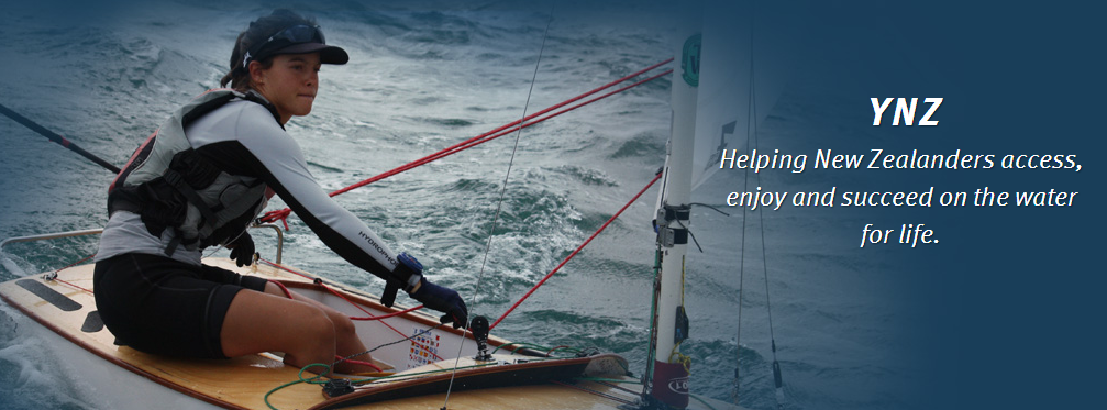 A person sailing a small boat on choppy water, wearing a cap and life jacket. Text reads: 'YNZ. Helping New Zealanders access, enjoy and succeed on the water for life.
