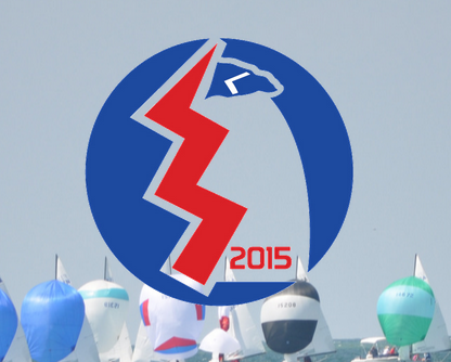 A blue and white logo with a red zigzag and the year '2015' overlays a photo of sailboats with colorful sails on the water.