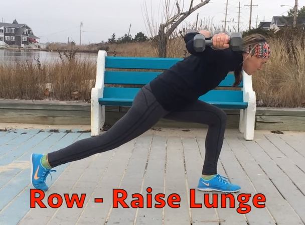 A woman in athletic wear performs a row-raise lunge with dumbbells on a boardwalk, next to a blue bench and marshy water. Red text at the bottom reads, 'Row - Raise Lunge.
