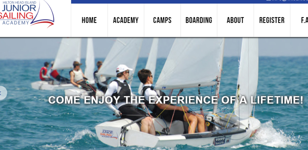 Several teens sail small boats on clear blue water under sunny skies. The text 'COME ENJOY THE EXPERIENCE OF A LIFETIME!' is displayed, promoting the Hilton Head Island Junior Sailing Academy.