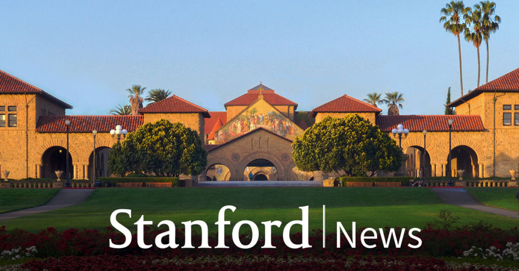 Stanford University campus with arched stone buildings, red tile roofs, palm trees, and green lawns under a clear blue sky; 'Stanford News' text overlay at the bottom.