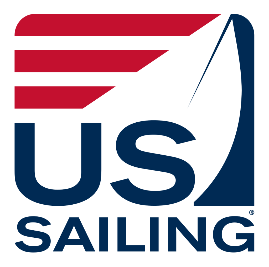 USA Sailing logo with three red stripes, a stylized blue sail, and the words 'US SAILING' in bold letters beneath the stripes and sail design, all on a white background.