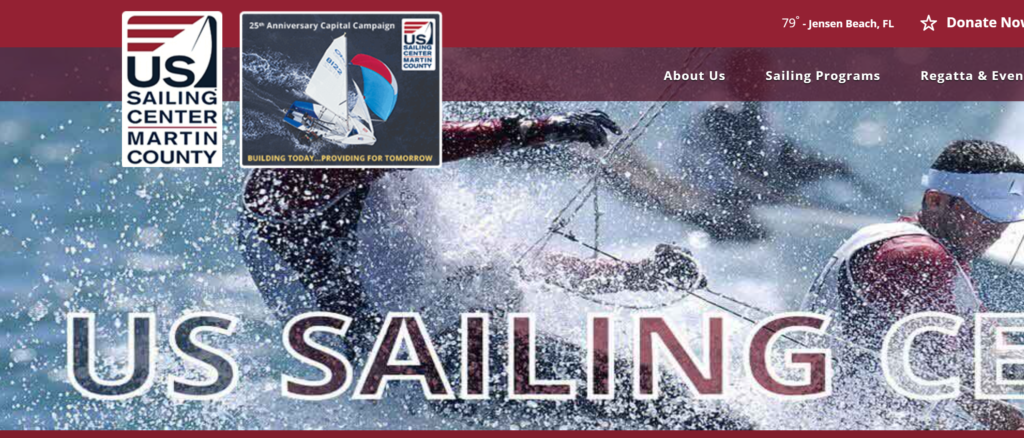 A website banner for US Sailing Center Martin County shows sailors racing on a boat in splashing water. The logo and a '29th Anniversary Capital Campaign' badge appear at the top left. The navigation menu is at the top right.