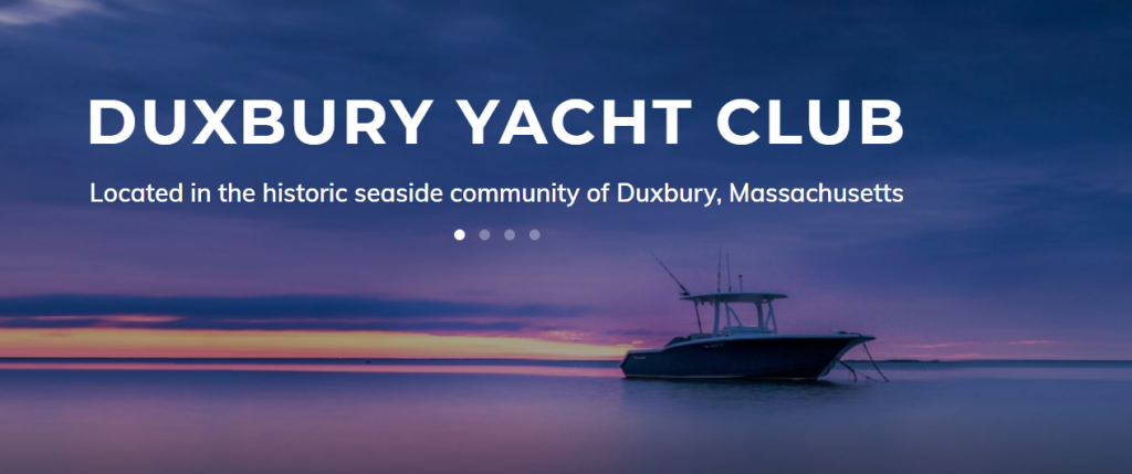 A small yacht rests on calm water at sunset with a colorful sky; text reads 'DUXBURY YACHT CLUB, Located in the historic seaside community of Duxbury, Massachusetts.