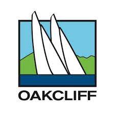 Logo with three white sailboats on blue water, green hills and blue sky in the background, contained within a square. The word 'OAKCLIFF' appears in bold black letters below the image.