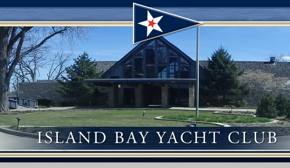 A triangular building with large windows and a flagpole stands surrounded by trees and grass. A pennant with a star and the text “Island Bay Yacht Club” appears at the top and bottom of the image.